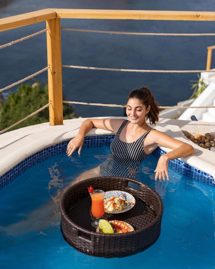 Benben By Dhara Hotels - Adults Only Aswan Exterior photo A woman in a swimming pool