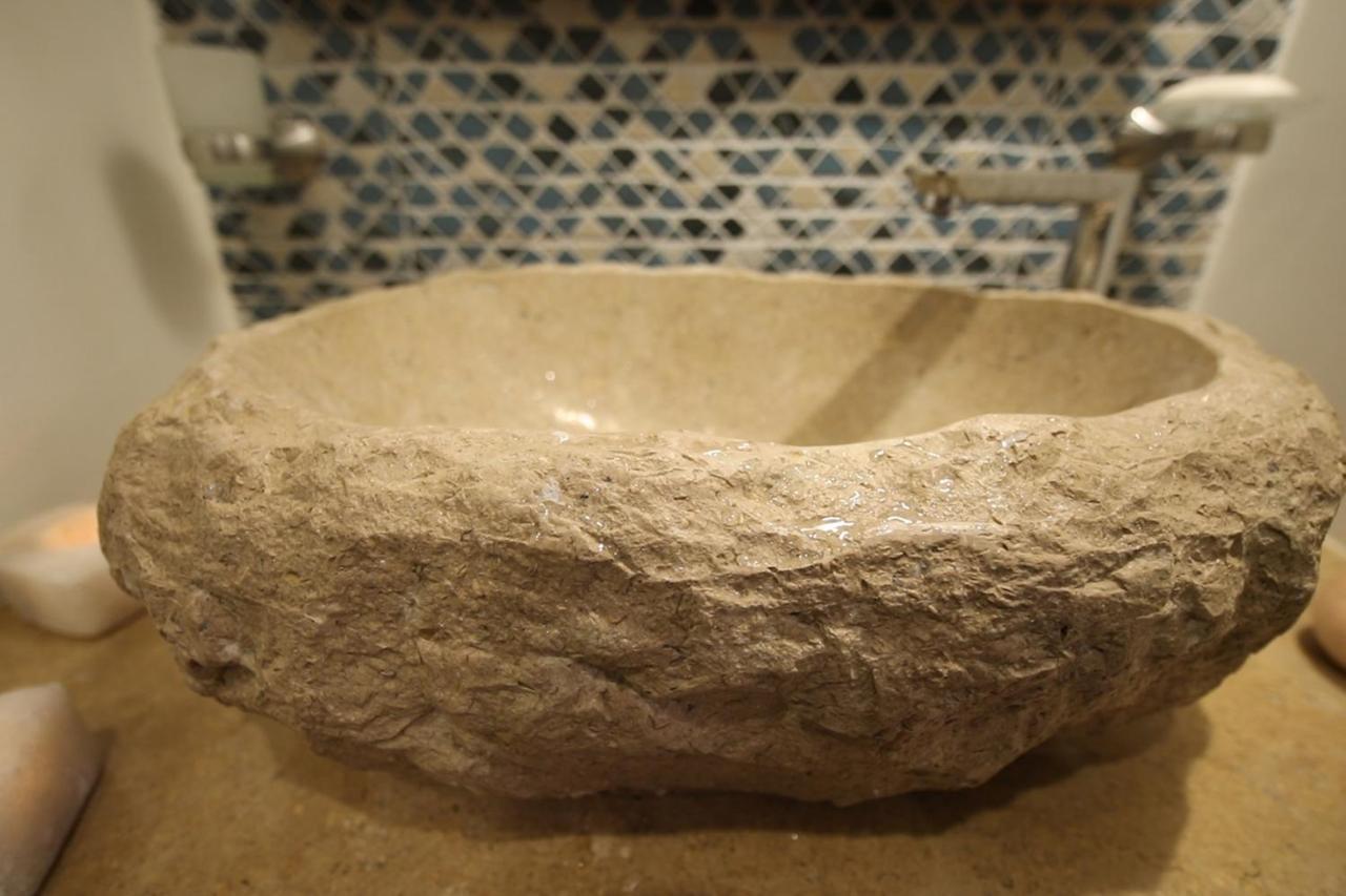 Benben By Dhara Hotels - Adults Only Aswan Exterior photo A stone sink