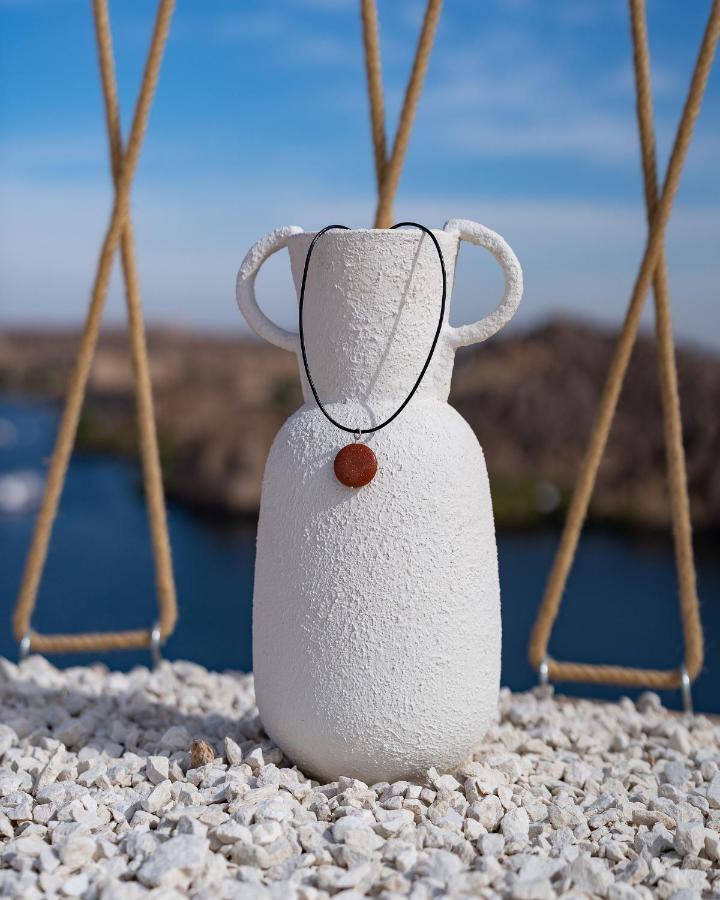 Benben By Dhara Hotels - Adults Only Aswan Exterior photo A necklace with a pendant