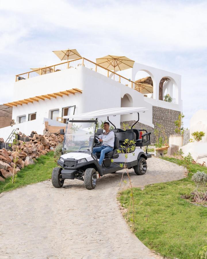 Benben By Dhara Hotels - Adults Only Aswan Exterior photo Club Car Villager