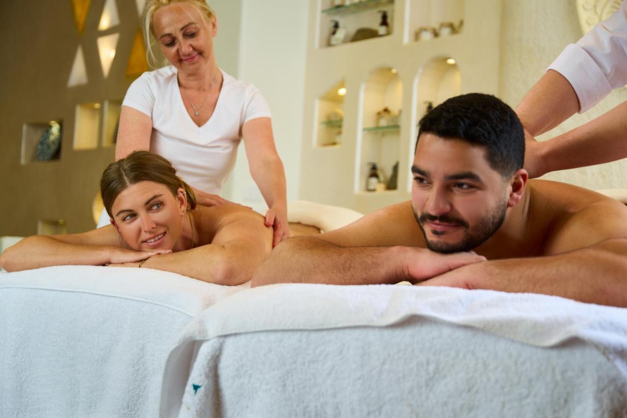 Benben By Dhara Hotels - Adults Only Aswan Exterior photo Massage therapists working on a couple