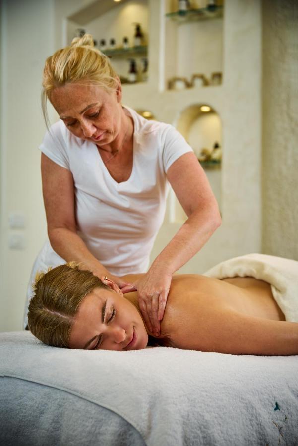 Benben By Dhara Hotels - Adults Only Aswan Exterior photo A massage therapist treating a patient